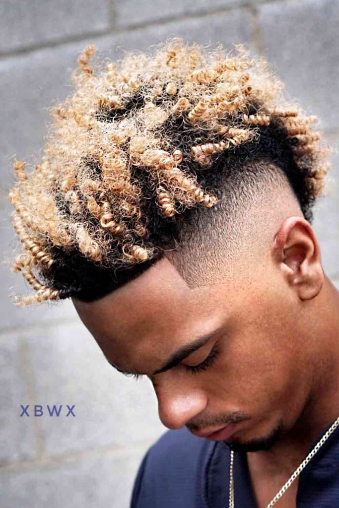 Undercut Fade Highlighted Mohawk #blackmenhaircuts #blackmenhairstyles #afrohaircuts #haircutsforblackmen