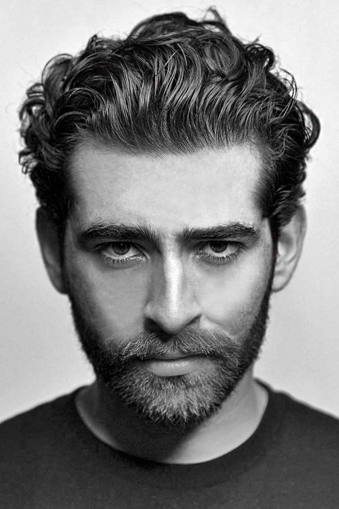 Wavy Slicked Back Haircuts For Men Thick Hair #thickahirmen #haircutsformenwiththickhair #thickhairhaircuts