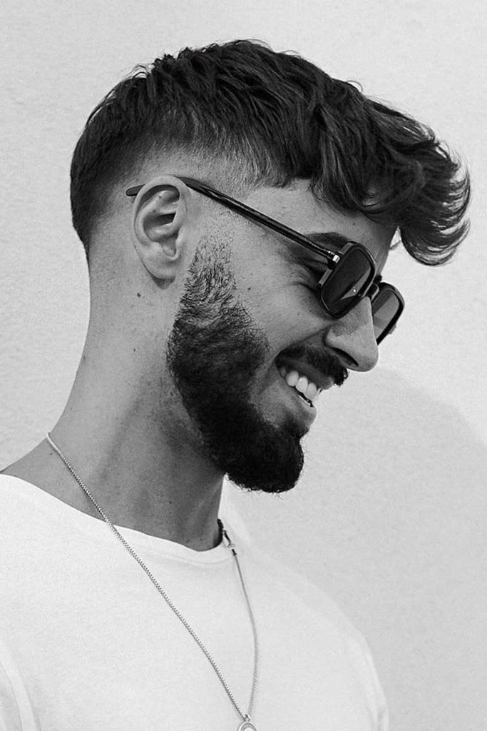 Faux Hawk Hairstyle + Mid Fade #wavyhairmen #wavyhairstylesformen #haircutsforwavyhair